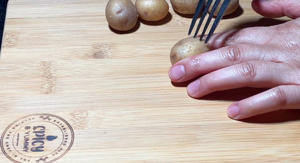 InShot_20220215_221442398 – Spicyum Taking baby potatoes to make Our Kashmiri Dum Aloo.